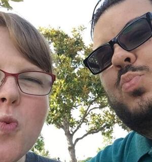 a man and a woman wearing sunglasses