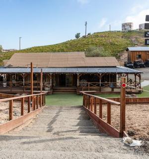 a building on the side of a road