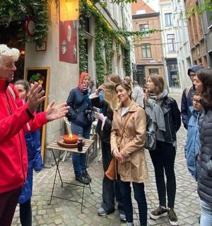 a group of people standing on a street