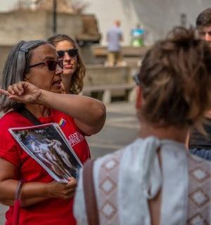 a group of people standing on the street