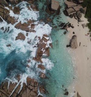 an aerial view of a beach and the ocean