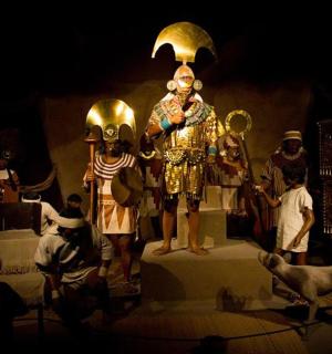 a group of people standing on a stage in a performance