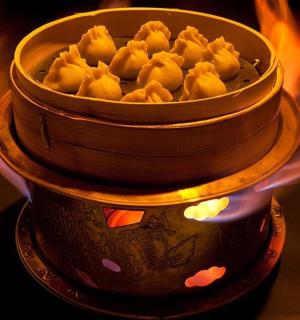 a pot on fire with food in it