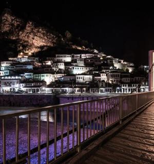 a night view of a building on a mountain