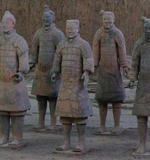 a statue of a group of men in uniform