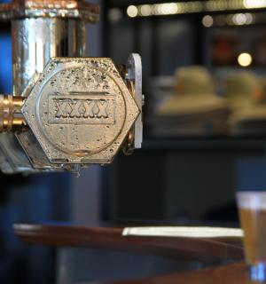 a close up of two glasses of beer