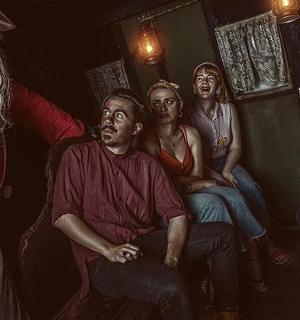 a group of men sitting in a room