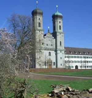 a large building with two towers on top of it