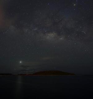 a starry night with the milky way over the ocean