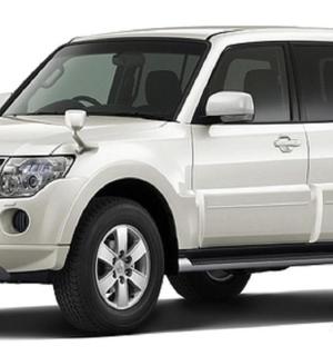 a white mitsubishi xpander parked