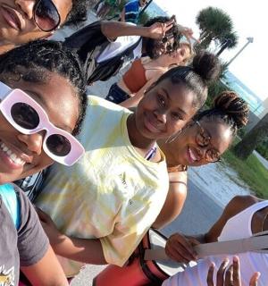 a group of young women posing for a picture