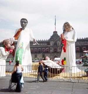 a group of people standing in front of a large building