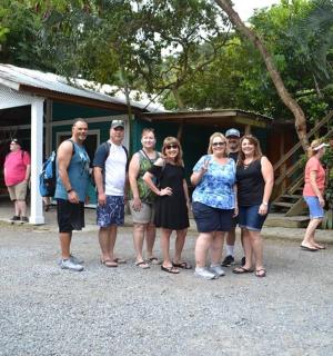 a group of people standing in front of a building