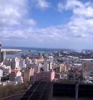 a view of a city from the top of a building