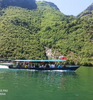 a group of people on a boat on a river