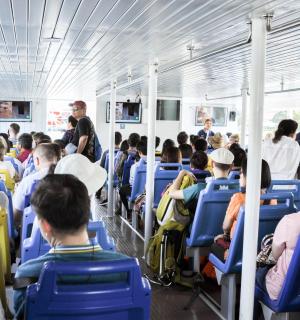 a group of people riding on a bus