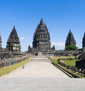 a group of temples with a blue sky in the background