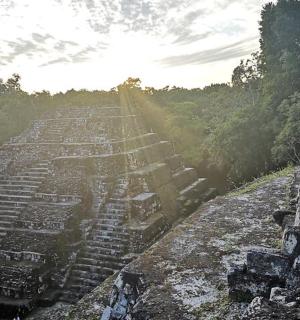 a view of the ruins of an ancient pyramid