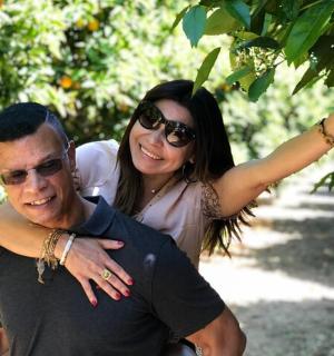 a man and a woman posing for a picture