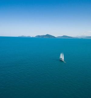 a boat in the middle of a large body of water