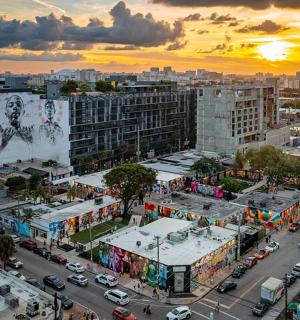 an aerial view of a city with traffic and buildings