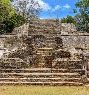 a large stone building with steps in front