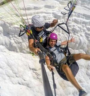 two people on a zipline in the snow