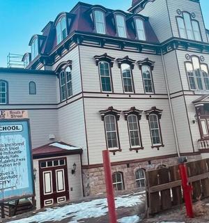 a large building with a sign in front of it