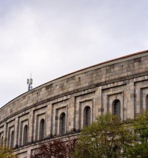 a large stone building with many windows on it