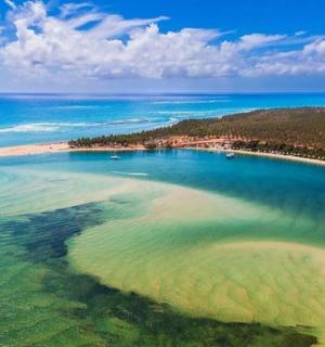 an aerial view of a beach in the ocean