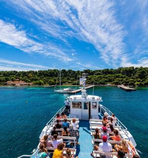 a group of people on a boat in the water