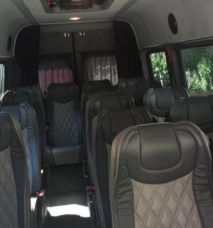 an empty van with empty seats in a vehicle