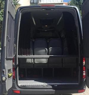 an open back of a van with the back door open