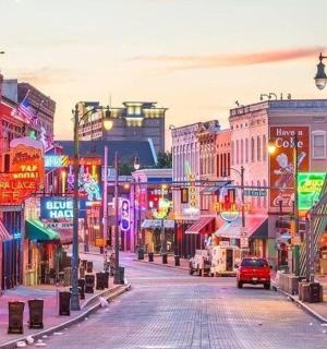 a city street filled with lots of neon signs