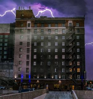 a building with lightning bolts on top of it