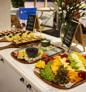 a buffet filled with different types of food on a table