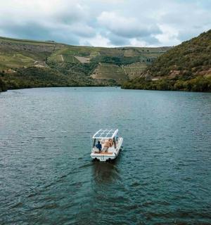 a couple of people in a boat on a lake