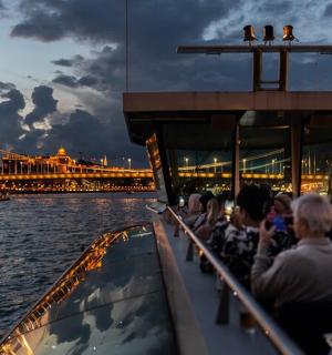 a group of people riding on a boat in the water