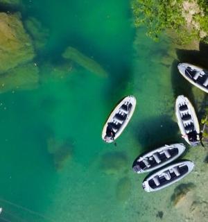a group of boats parked in the water
