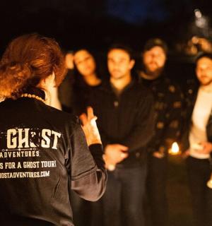 a group of people standing in front of a crowd