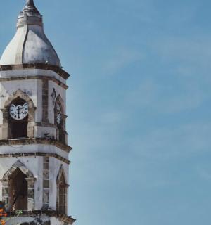 a tall clock tower with a clock on it