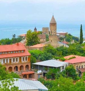 a group of buildings on top of a hill