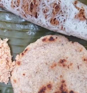 two pieces of bread sitting on a glass plate