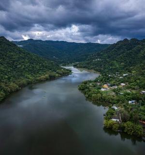 an aerial view of a river in a valley