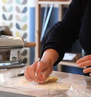 a person is preparing food on a counter