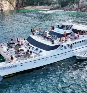 a group of people on a boat in the water