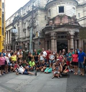 a group of people standing in front of a building