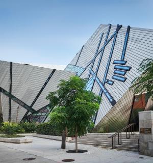 a building with a tree in front of it