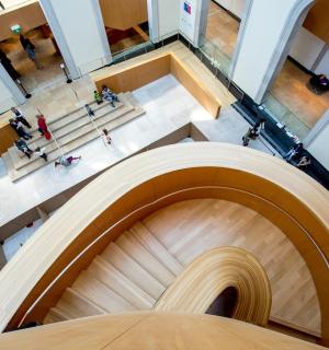 an overhead view of a spiral staircase in a building