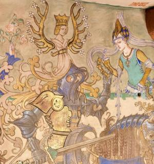 a painting on the side of a wall withgeons